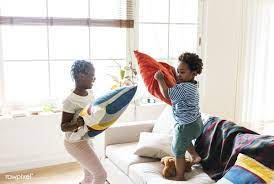 Download Premium Image Of Brother And Sister Pillow Fighting In Living Pillow Fight Kids Activities For Kids