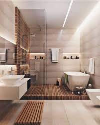 Sebagian besar kamar mandi menyimpan sejumlah warna metalik pada perangkat kerasnya, jadi mengapa tidak membuat warna emas itu? Desain Kamar Mandi Mewah Dan Modern Yang Nyaman