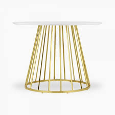 Circular dining tables are space efficient tables designed with a variety of common diameters for specific seating arrangements from small two person tables up to larger twelve person designs. Eva Round White Marble Dining Table Brass Cult Uk