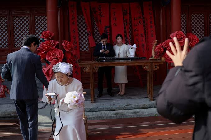 China's marriages drop to decade low, deepening demographic concerns |  Reuters