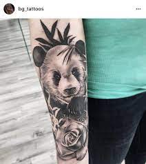 Panda Bear With Rose Tattoo On Inside Of Forearm Pandabear Rosetattoo Pandabeartattoo Rose Forearmtattoo Armtatto Panda Tattoo Panda Bear Tattoos Tattoos