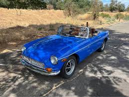 Image result for Tahiti Blue 1977 MG