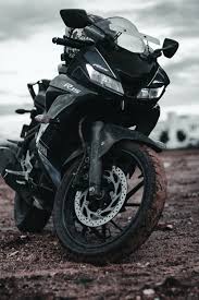 Black Sports Bike On Brown Dirt Road During Daytime Photo Free Machine Image On Unsplash