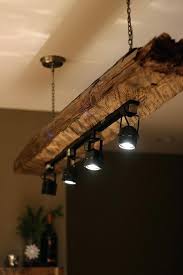 Pin By Holmes County Flea Market On Rustic Lighting Ideas Rustic Light Fixtures Rustic Lighting Wood Light Fixture
