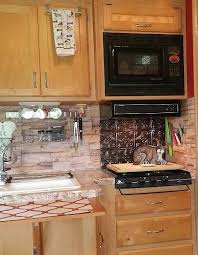 Faux Stone Wallpaper Backsplash In An Rv Kitchen Rv Kitchen Diy Backsplash Backsplash