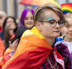 2019: Young Blonde Girl Wearing a Rainbow Flag Attending the Gay Pride  Parade Also Known As Christopher Street Day CSD, Munich Editorial Photo