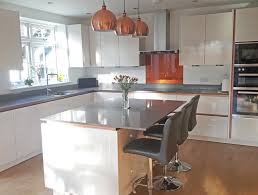 We would like to show you a description here but the site won't allow us. Keller Handleless Kitchen In Magnolia High Gloss Synthetic Finish With Copper Handle Trims And Grey Quartz Worktops Keller Design Centre Lytham Fitted Kitchen Design