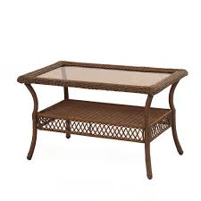 The 18 coffee table height, will offer warmth at a lower level, starting with your guest's legs while seating surrounding the rectangular table. Hampton Bay Spring Haven Brown All Weather Wicker Outdoor Patio Coffee Table The Home Depot Canada
