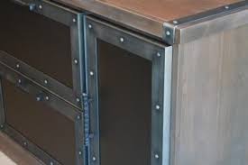 Metal Cabinet Doors Aren T Just For Kitchens And Bathrooms Create A Custom Entertainment Center In Your Living Cabinet Doors Metal Decor Custom Cabinet Doors