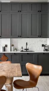 Dark cabinets with beige countertops.you can pair your dark cabinets with white countertops. 25 Marble Kitchen Backsplashes For A Refined Touch Digsdigs