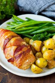 Pour wine over chicken and bake 20 to 25 minutes longer. Bacon Wrapped Stuffed Chicken Breast Dinner At The Zoo