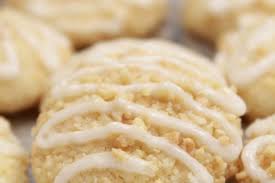 In a medium bowl, whisk together powdered sugar and lemon juice. Christmas Cookie Recipes Lemon Sno Balls Are Crumbly Good