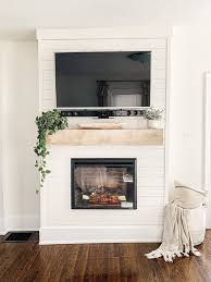 Ensure that the television is well within the demarcated place without poking over the edge. Diy Shiplap Electric Fireplace Mantel Micheala Diane Designs