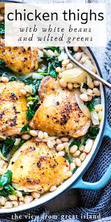 Chicken Thighs With White Beans And Wilted Greens In 2020 Chicken Dinner Recipes Beef Recipes Favorite Recipes Chicken