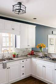 How white kitchen cabinets can update a space. Pin On Kitchen Ideas