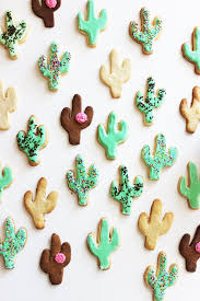 Use a small icing spatula to frost the surface of the cupcake, excluding the small hole you created. Recipe Cacti Cookies For Cinco De Mayo Poppytalk