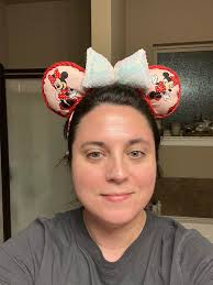 What is the best way to attach ears to dolls?