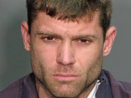 Warrant: Man shot during drug raid pointed gun at officers