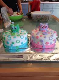 At a baby shower party, the cake should reflect the parents' style, the colors in the other decorations, the gender of the baby if known, or the date popular trends are elephants, woodland scenes, hot air balloons, monkeys and realistic detail are seen in cakes seen on the internet and in bakery advertising. Baby Shower Owl Red Velvet Cake For Twin Boy And Girl 1st Birthday Cakes Cupcake Cakes Twin Birthday Cakes