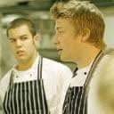 Oliver tucks into school dinners