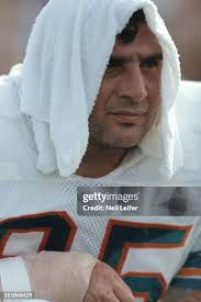 Miami Dolphins Bob Heinz , Doug Swift , and Manny Fernandez lined up...  News Photo