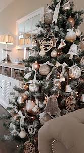 There are so many pieces of jewelry on this tree. Inspiring Rustic Christmas Tree Decoration Ideas For Cheerful Day 09 Homedecorish Christmas Tree Inspiration Cool Christmas Trees Christmas Decorations Rustic Tree