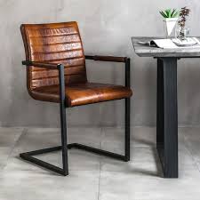 Duke Industrial Vintage Brown Faux Leather Dining Armchair 2 Qty The Furniture Market Leather Dining Chairs Faux Leather Dining Chairs Dining Chairs