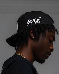 𝐓𝐇𝐄 𝐀𝐂𝐄 𝐈𝐒 𝐎𝐔𝐓 𝐎𝐅 𝐓𝐇𝐄 𝐁𝐀𝐆 ♠️ #𝐒𝐩𝐚𝐝𝐞𝐀𝐩𝐩𝐚𝐫𝐞𝐥  ™️ 𝐮𝐧𝐯𝐞𝐢𝐥𝐬 𝐨𝐮𝐫 “𝐀𝐜𝐞 𝐨𝐟 𝐒𝐩𝐚𝐝𝐞𝐬” 𝐂𝐨𝐥𝐥𝐞𝐜𝐭𝐢𝐨𝐧 🏆  Champagne Tan or Ace Black Baseball Hat 🧢: $240 TTD