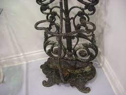 French cast iron corner portmanteau, hall tree with a hunt motif. Antique French Cast Iron Hall Tree At 1stdibs