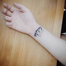 Symbol of the cross back. 24 Tattoos That Are Considered To Be Good Luck