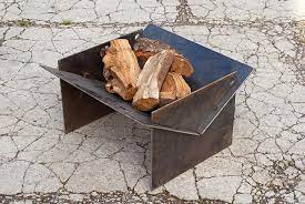 Foldable fire pit grill made of aircraft aluminum and stainless steel, comes in tubular carrying bags perfect to take camping. the bali outdoors wood burning fire pit is an amazing fire pit grill that will not only impress you with its performance but also enhance the aesthetics of your backyard. Tecton Collapsible Fire Pit For Camping Assemble And Fire Up The Logs