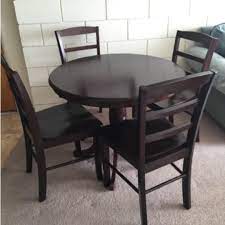 Anchor your space with a large area rug, such as an 8 foot by 10 foot rug. Apartment Size Dining Table And Chairs Apartment Post