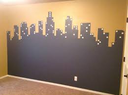 We recommend using a white primer. City Skyline Painted On Wall In Gray Paint With Yellow Paint As Background Color City Windows Squares Painted Over In Glo Wall Colors Room Paint Window Wall