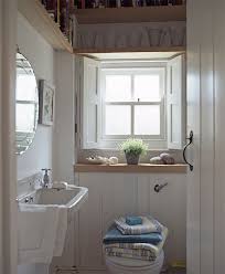 6 Decorating Ideas To Make Small Bathrooms Big In Style Small Cottage Bathrooms Small Cabin Bathroom Small Country Bathrooms