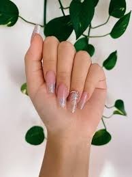 To create an ombre nail design, start by pouring white, blue, and red glitter into three separate dappin dishes. First Time Trying Acrylic Glitter Ombre Nails On Myself Nails