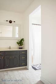 You can find distinct dark bathroom cabinets such as ceramic ones, wooden ones, metal ones and many others, depending on your preference. Budget Friendly Bathroom Makeover With Dark Cabinets Bigger Than The Three Of Us