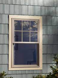 Beige Window And Gray Siding Windows Exterior House Paint Exterior Window Grids