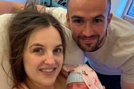 Baby boy joy: Dundalk star Michael Duffy watched the match 'while I gave  her gas and air'