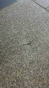 When pea gravel concrete becomes exceptionally cracked, faded or worn down, resurfacing is a task that can restore the concrete to its best look without professional help. How To Fix A Cracked Pea Gravel Pool Deck Pea Gravel Pea Gravel Patio Pebble Patio