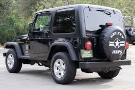Image result for Brilliant Black 2005 Jeep