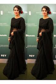 She looked stunning sitting on the tumbona, twirling on. Bollywood Replica Kajol In Black Designer Embroidery Net Half And Half Saree 34 Ib 443
