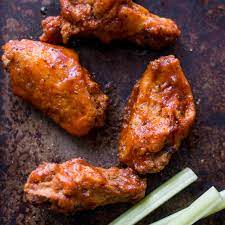Come this november the chickens at roost air will be celebrating 20 years in business! Spicy Sriracha Chicken Wings Recipe Michael Symon Food Wine