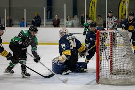 Catching pucks in a snow storm, that's our Jonny. #ThunderHockey Image by  talented young photographer, Josh Telfer. Thanks for the pic, bud!  @dawnexposure