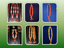 How can we miss adding the traditional tulsi leaf south indian wedding garland designs to our list? Fancy Florist Hindu Wedding Supplies And Gifts