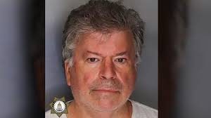 Former USA Softball president arrested, accused of lewd acts with a child