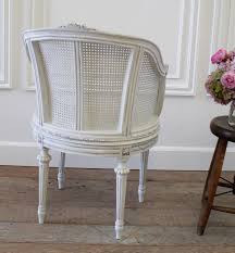 The seat cushions are upholstered in. Antique Louis Xvi French Painted Cane Barrel Chair With Rose Carvings At 1stdibs