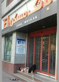 Iran Hrm On Twitter Image Of A Homeless Man Sleeping Outside A Branch Of Bank Maskan Housing Bank In Iran Bitter Irony