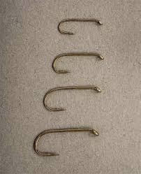 essential trout flies hooks midcurrent