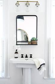 How To Choose The Right Bathroom Lighting Black Bathroom Mirrors Bathroom Interior Design Bathroom Mirror
