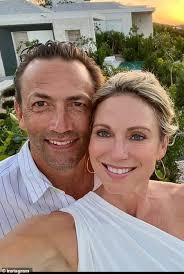 Amy Robach and T.J. Holmes ignite engagement rumors as she proudly flashes  ring